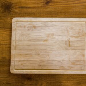 Acacia wood cutting board with juice groove