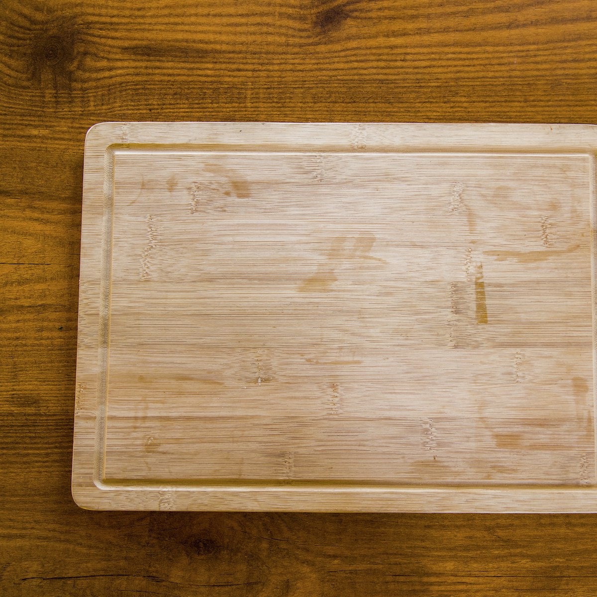 Acacia wood cutting board with juice groove