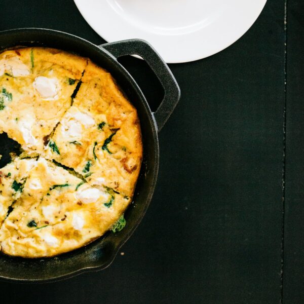 Cast iron skillet cooking a frittata