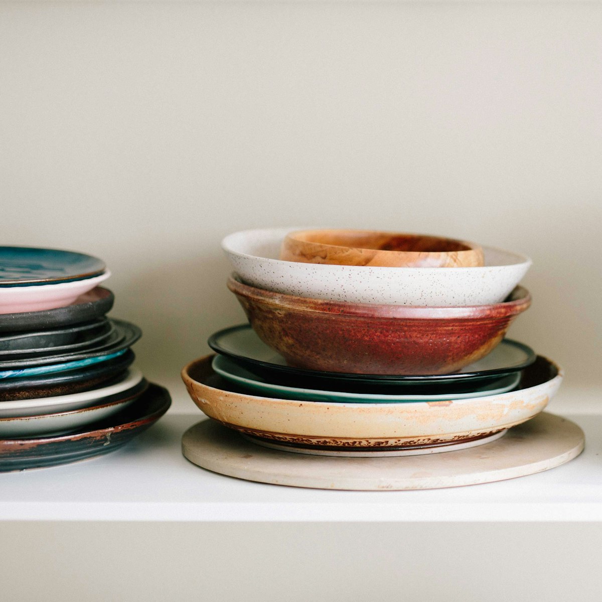 Stacked stoneware plates and bowls